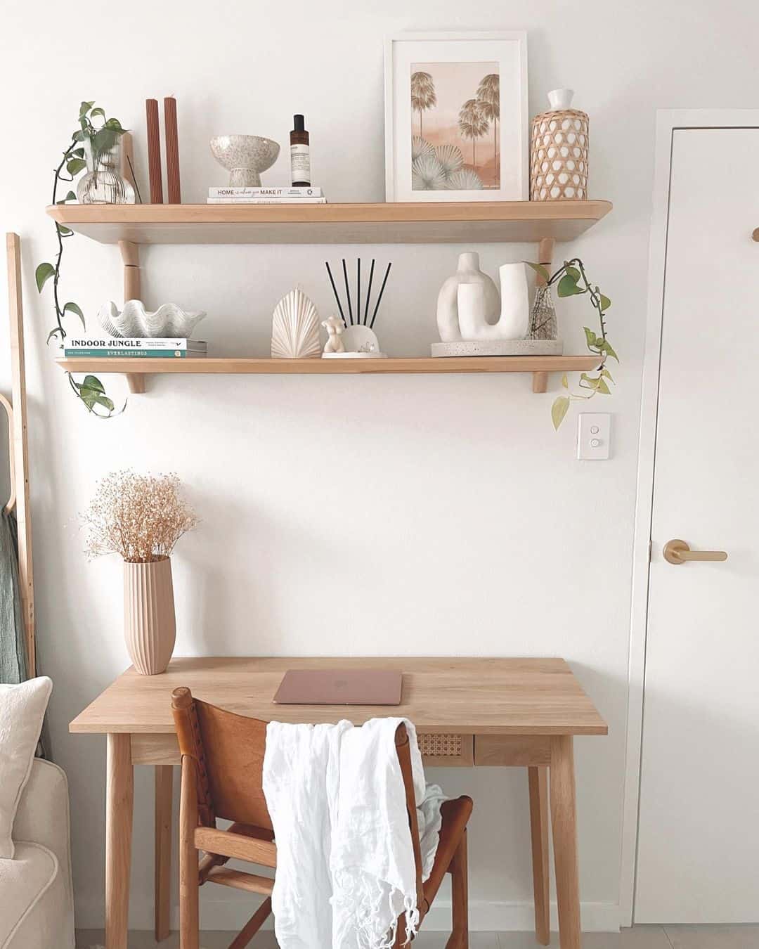 Sculptural Vases Add Artistic Flair to Shelving