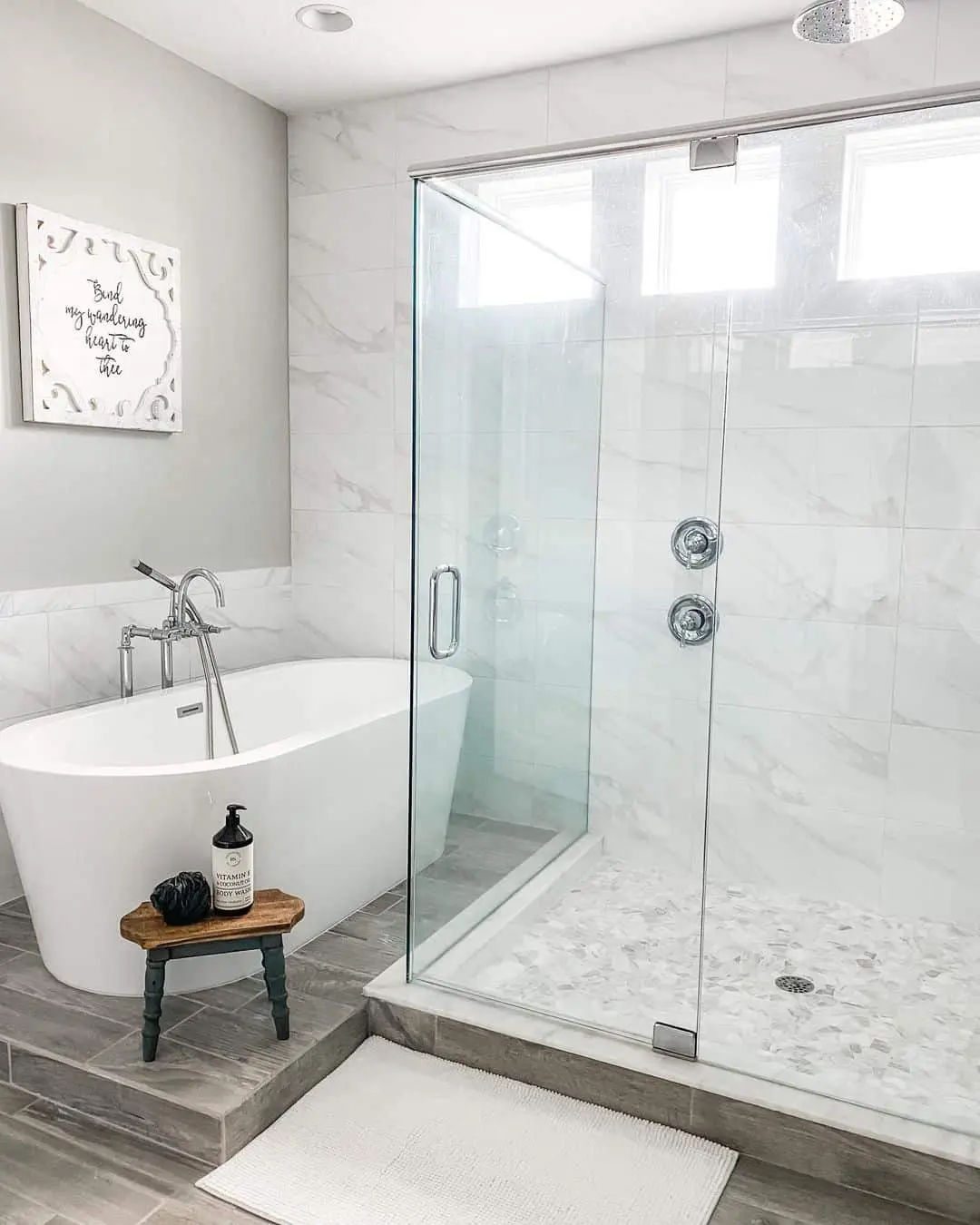 Irregularly Shaped Marble Tiles Create a Textured Shower Floor