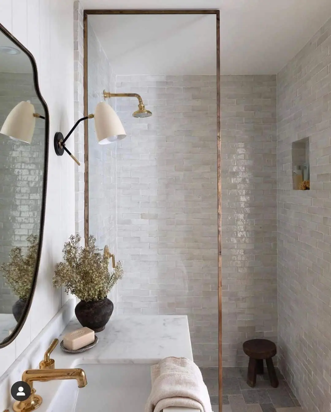 Subtle Iridescent Tile Creates a Soft, Luminescent Shower Backdrop
