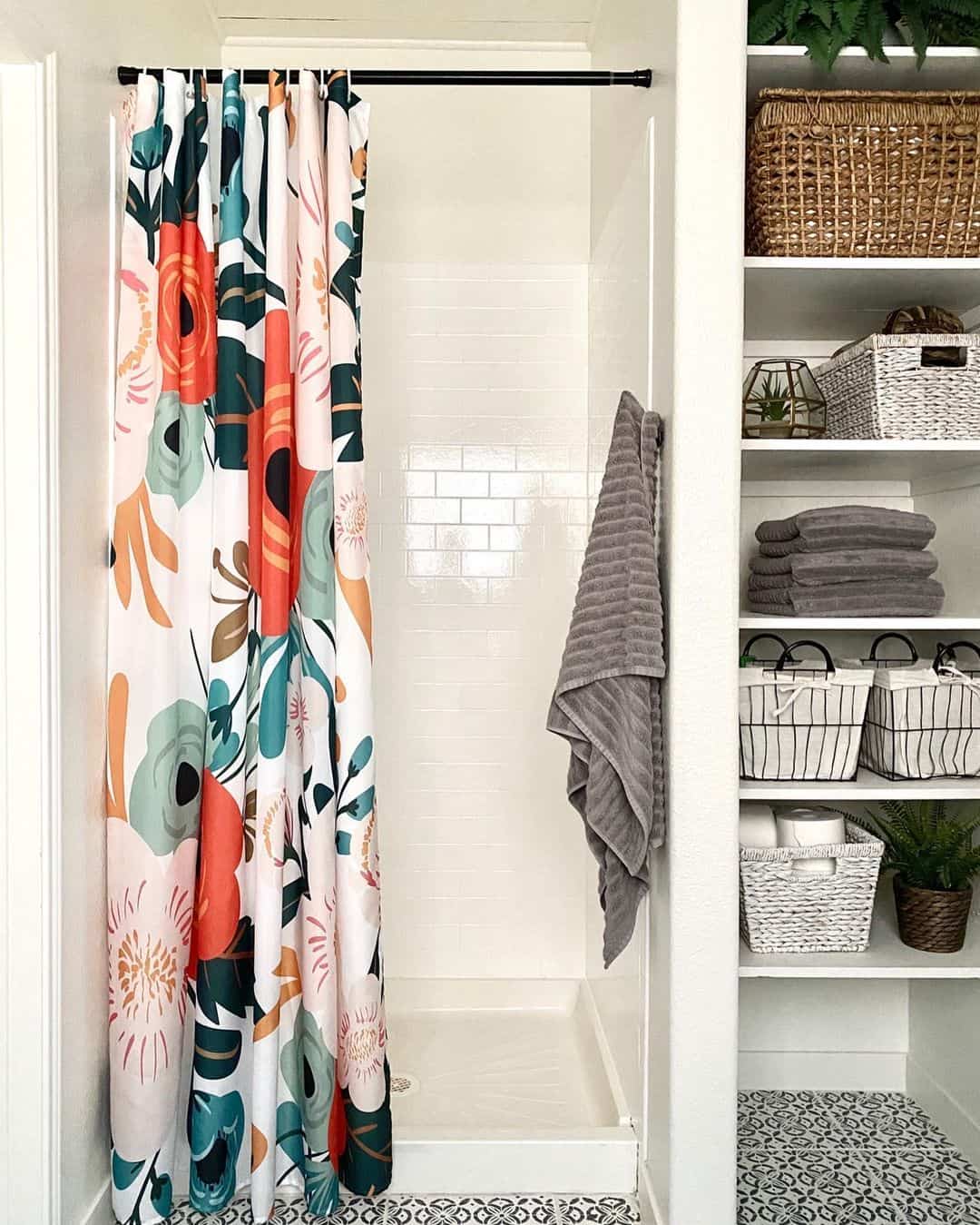 Bold Floral Shower Curtain Adds a Pop of Color to White Tile