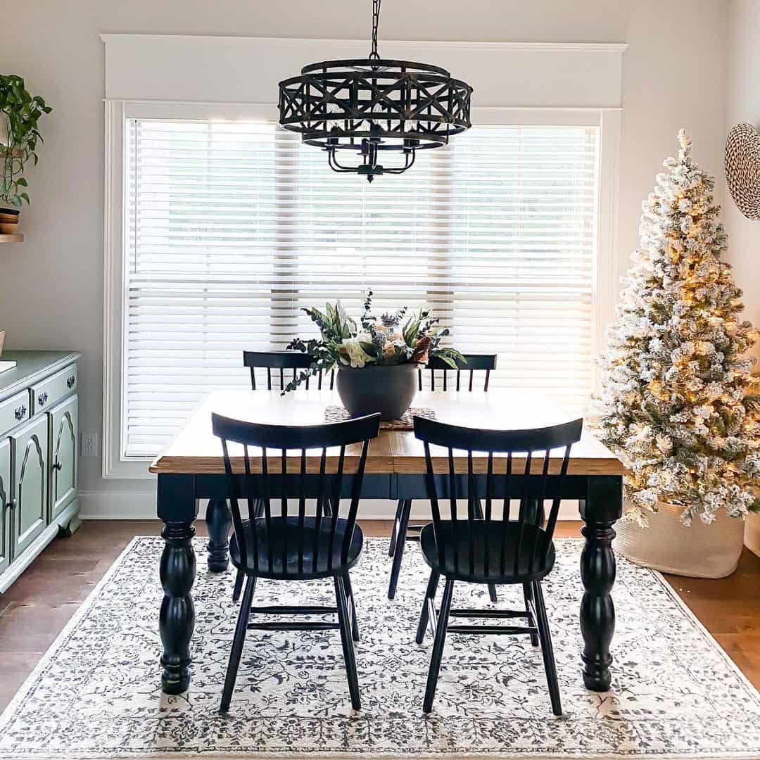 Grounded Farmhouse Style with Turned Legs and Black Chairs