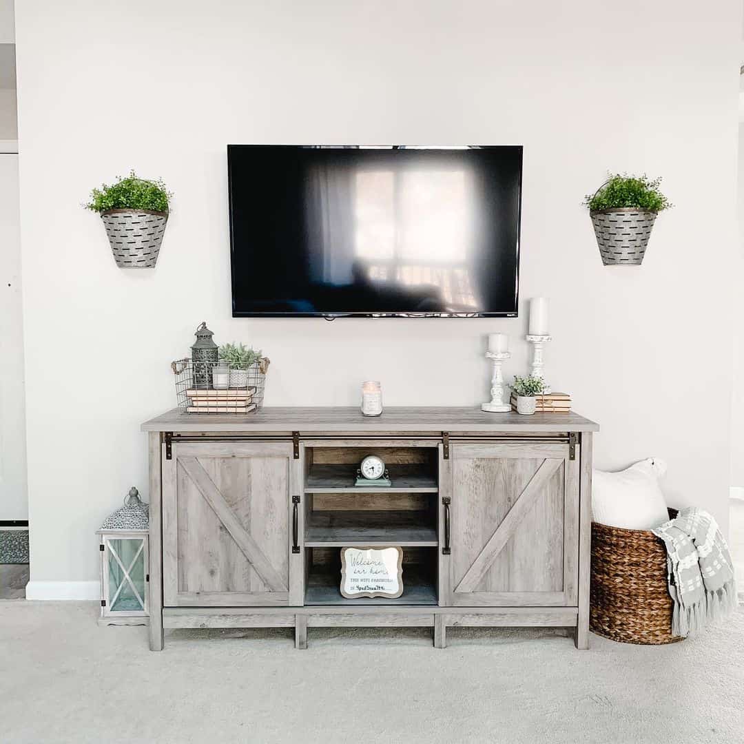 Galvanized Buckets Add Greenery Above the TV
