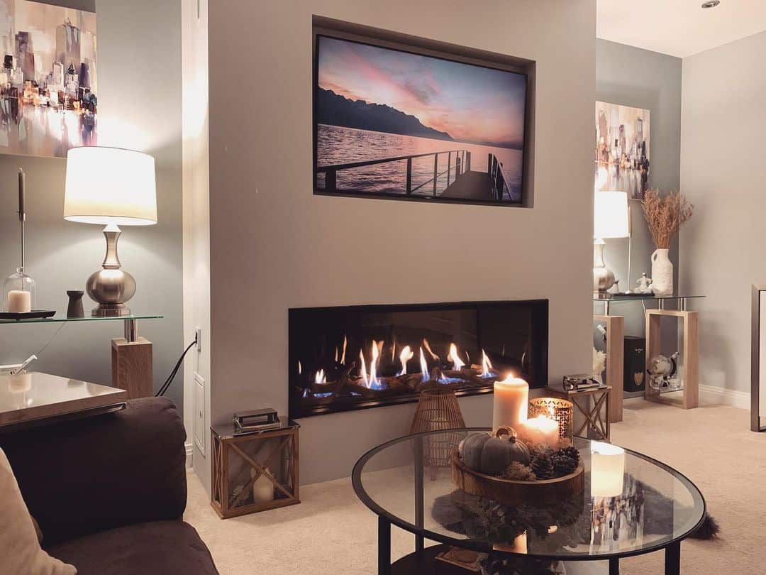 Recessed TV Creates a Sleek Focal Point Above Fireplace