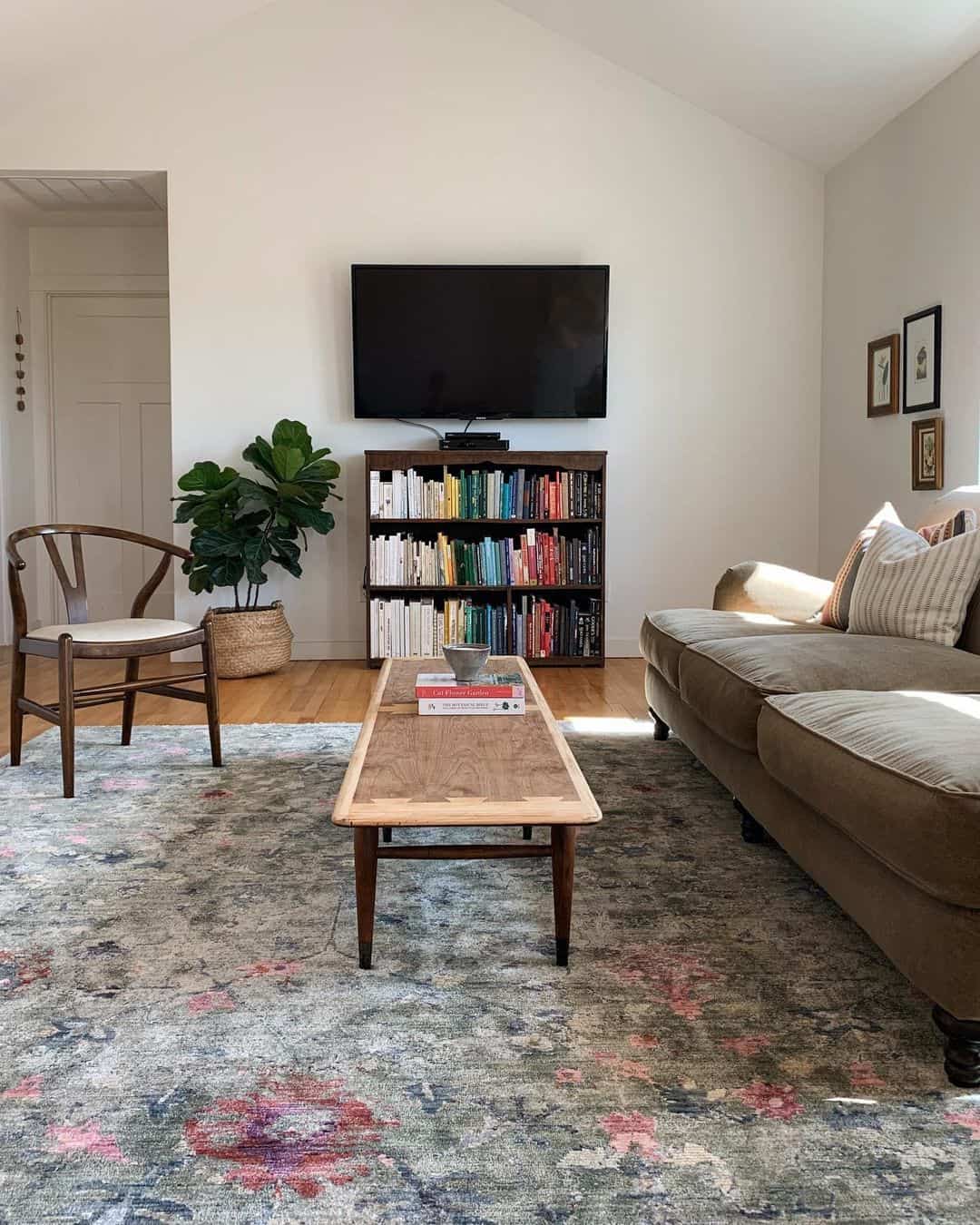 Dark Wood Bookshelf Frames TV for Cozy Media Wall