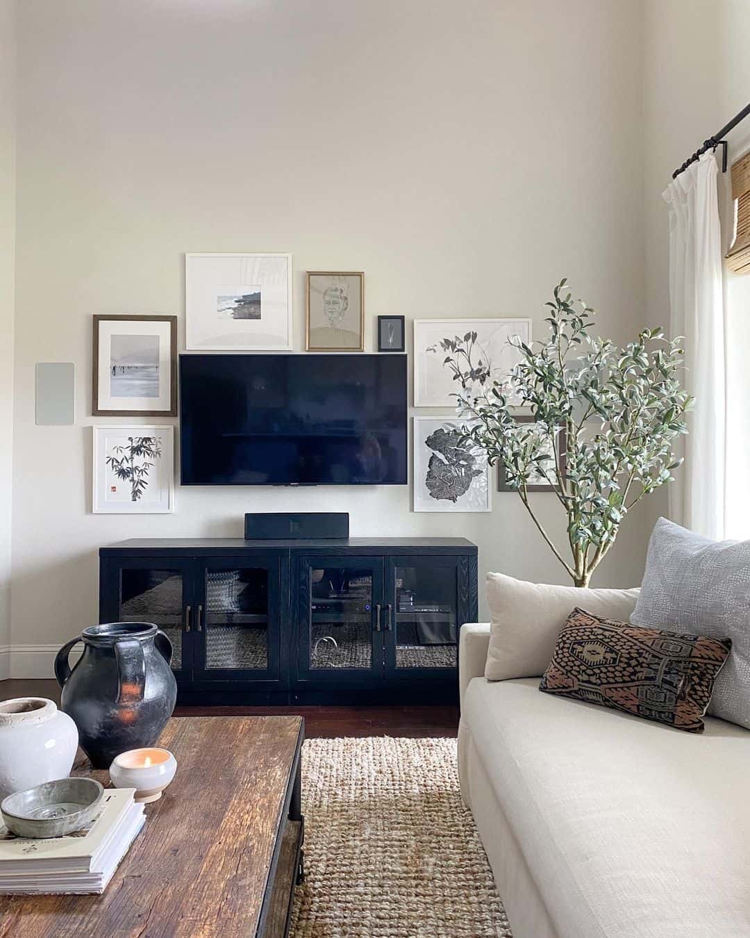 Gallery Wall Frames TV with Art and Photos