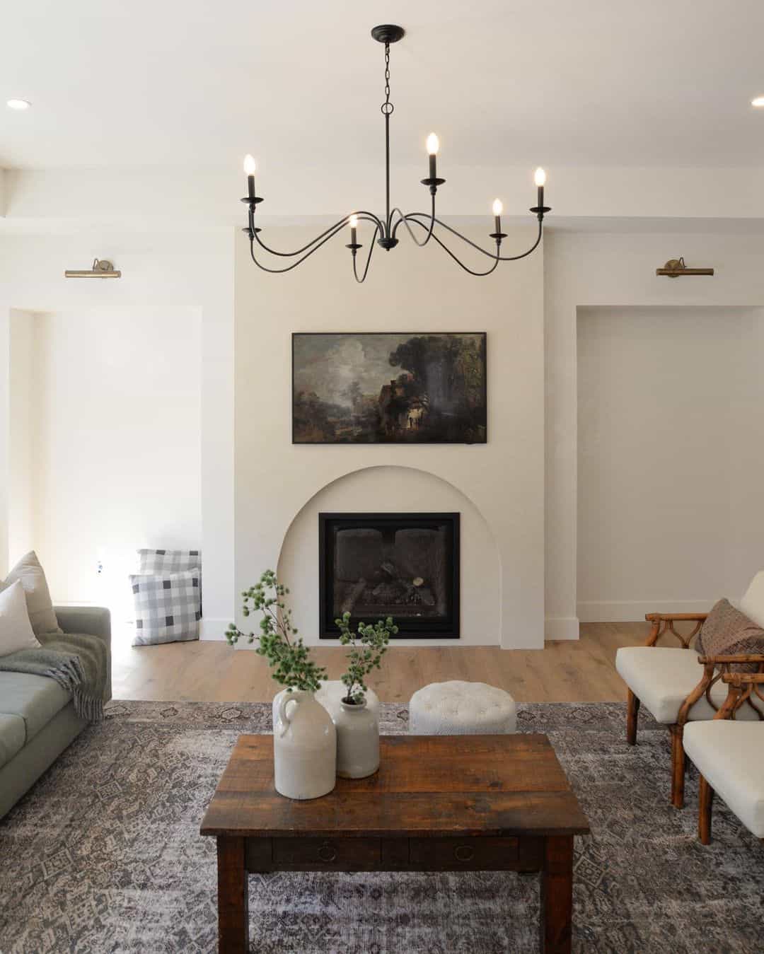 Arched Fireplace Frames Artwork Above the Hearth