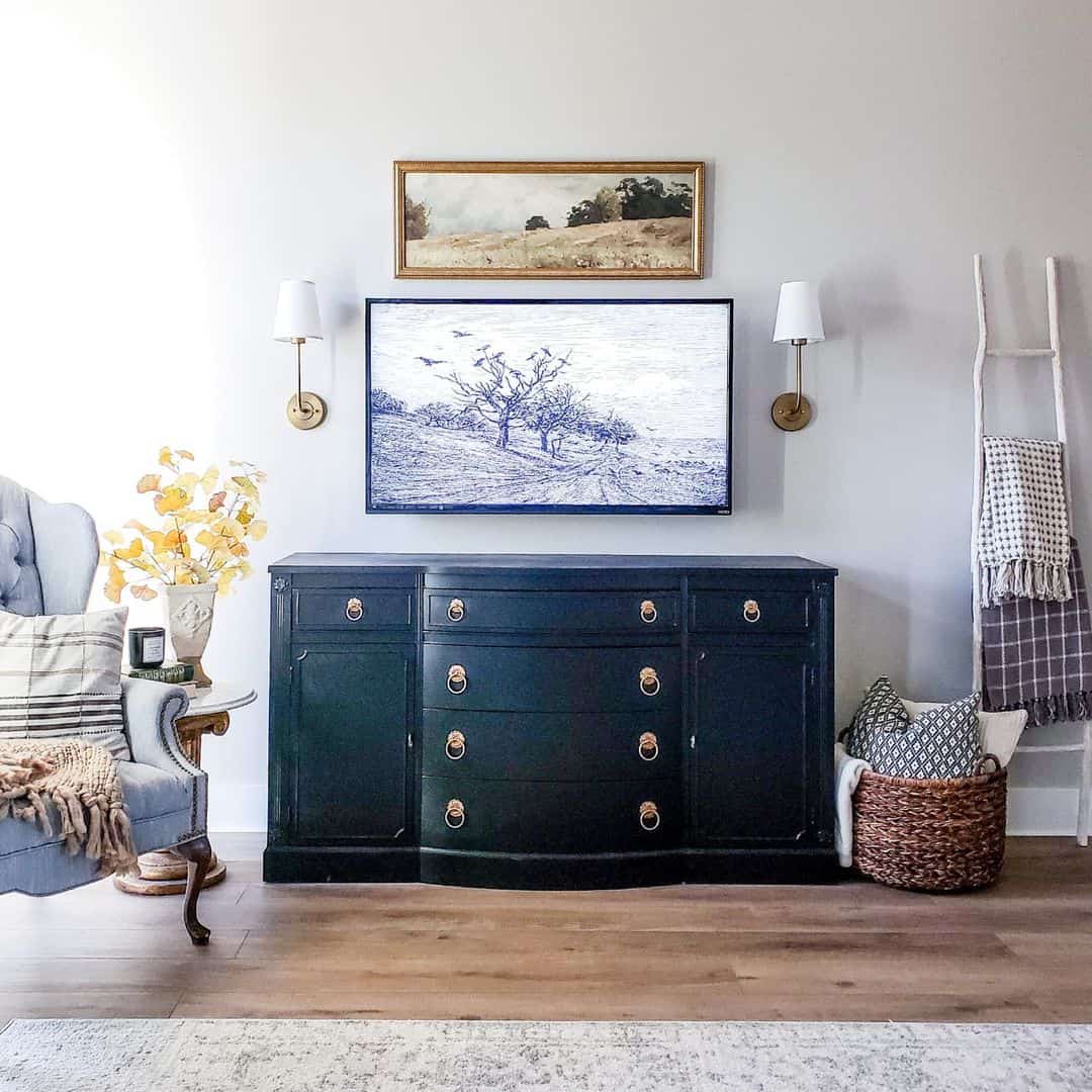 Dark Painted Dresser Hides Electronics Below Wall-Mounted TV