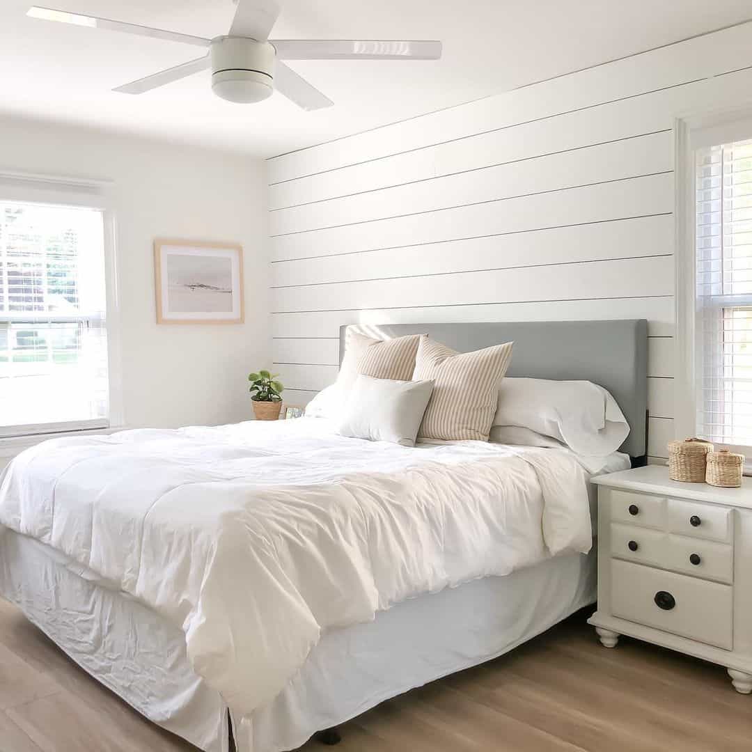 Grey Headboard Frames a Textured Bedscape