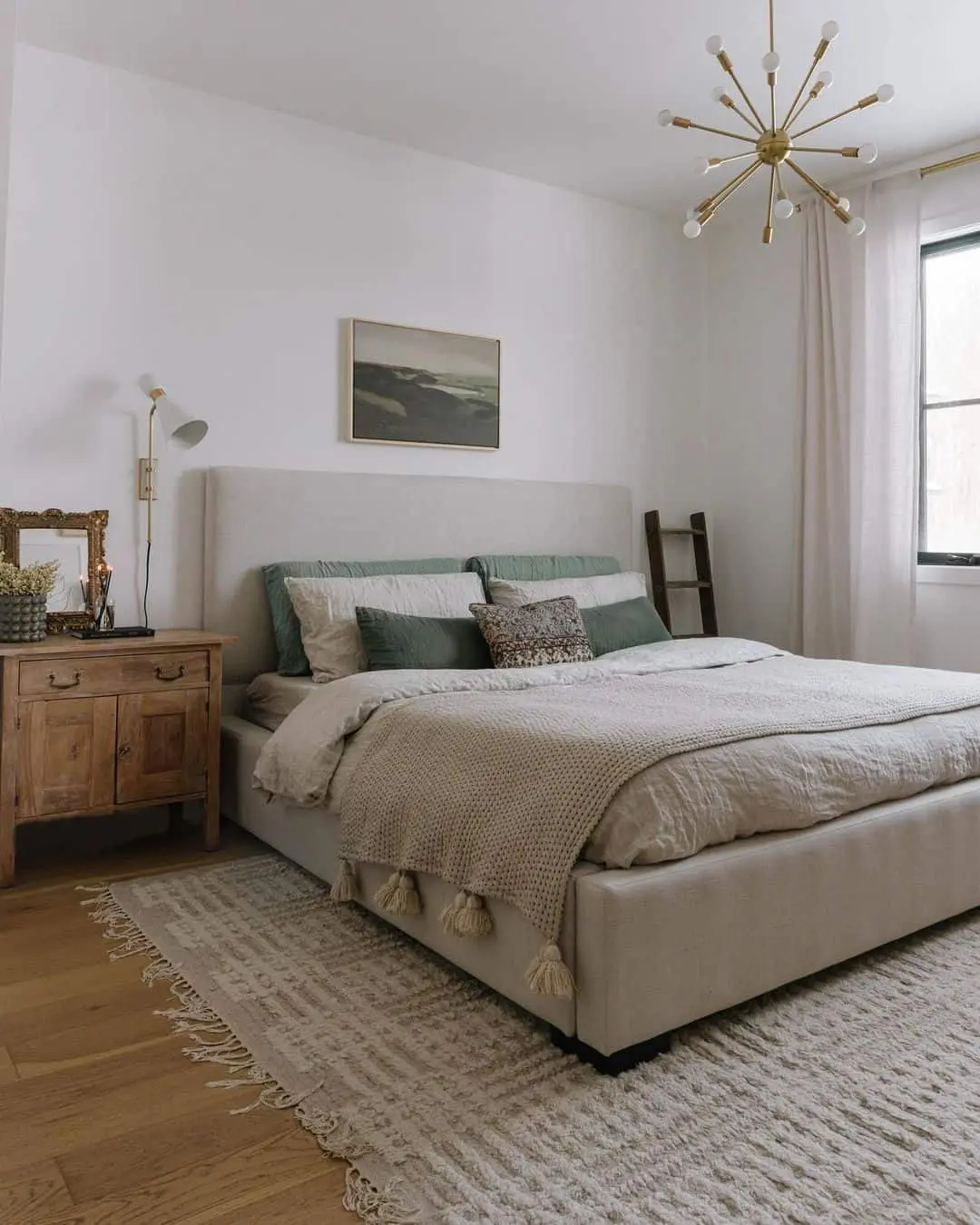 Neutral Bed Frame With Tasseled Throw