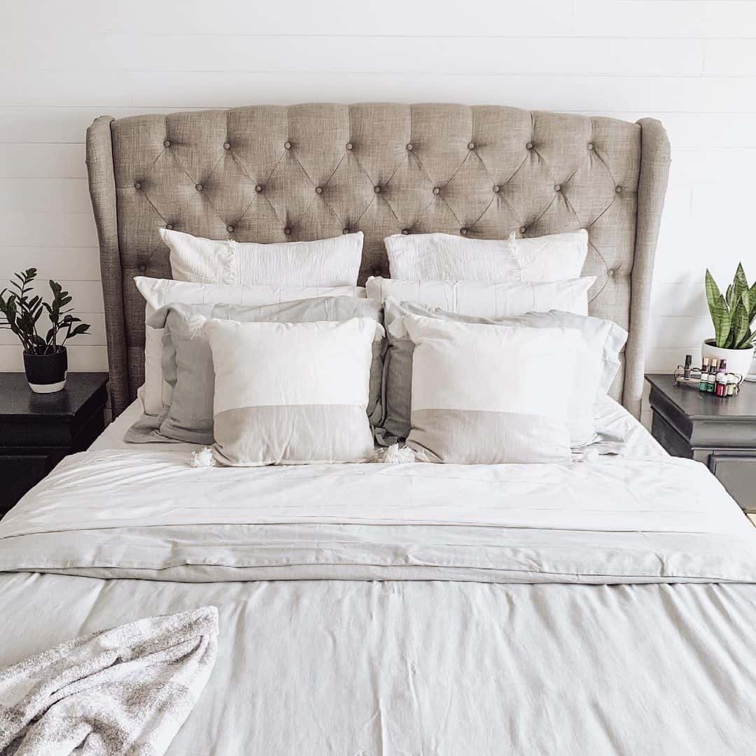 Tufted Wingback Headboard Creates a Cozy Bed Nook