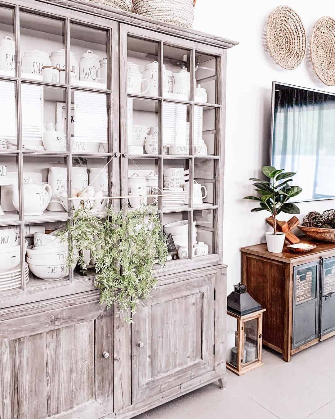 Rustic Gray Cabinet Displays White Ceramic Dinnerware
