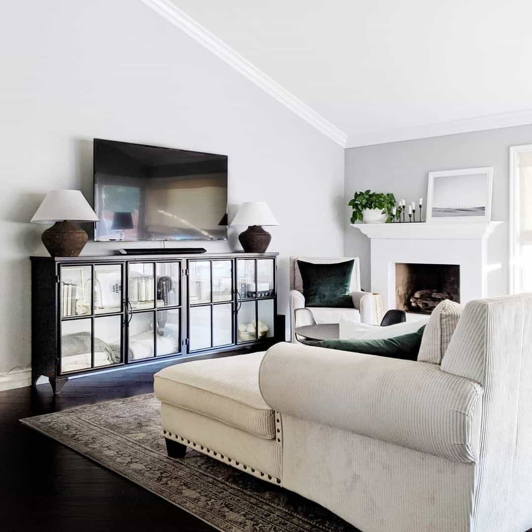 Offer Reflective Display with a Dark Metal Cabinet with Mirrored Doors