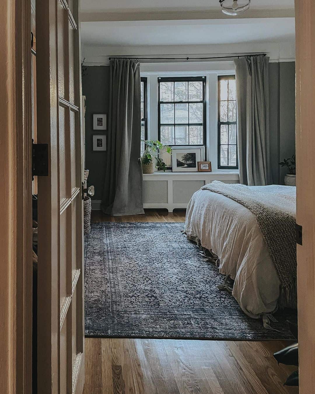 Anchor the Room with a Dark Floral Rug