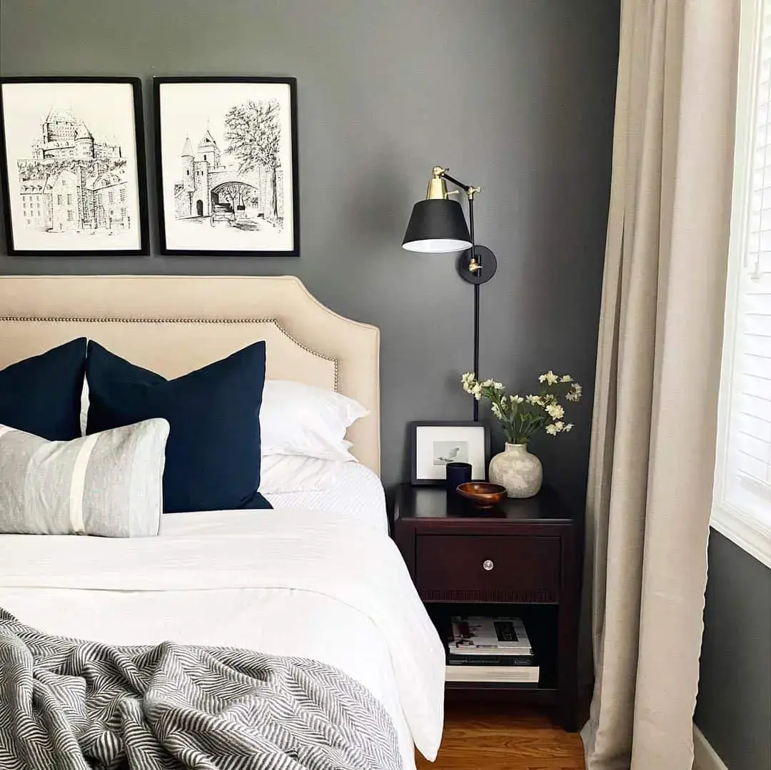 Black Swing Arm Lamp Adds Task Lighting Above Nightstand