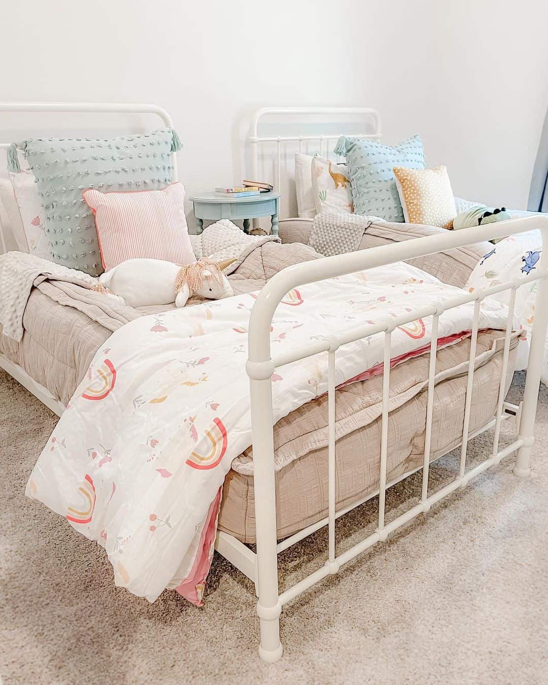 Frame a Shared Room with Identical White Beds
