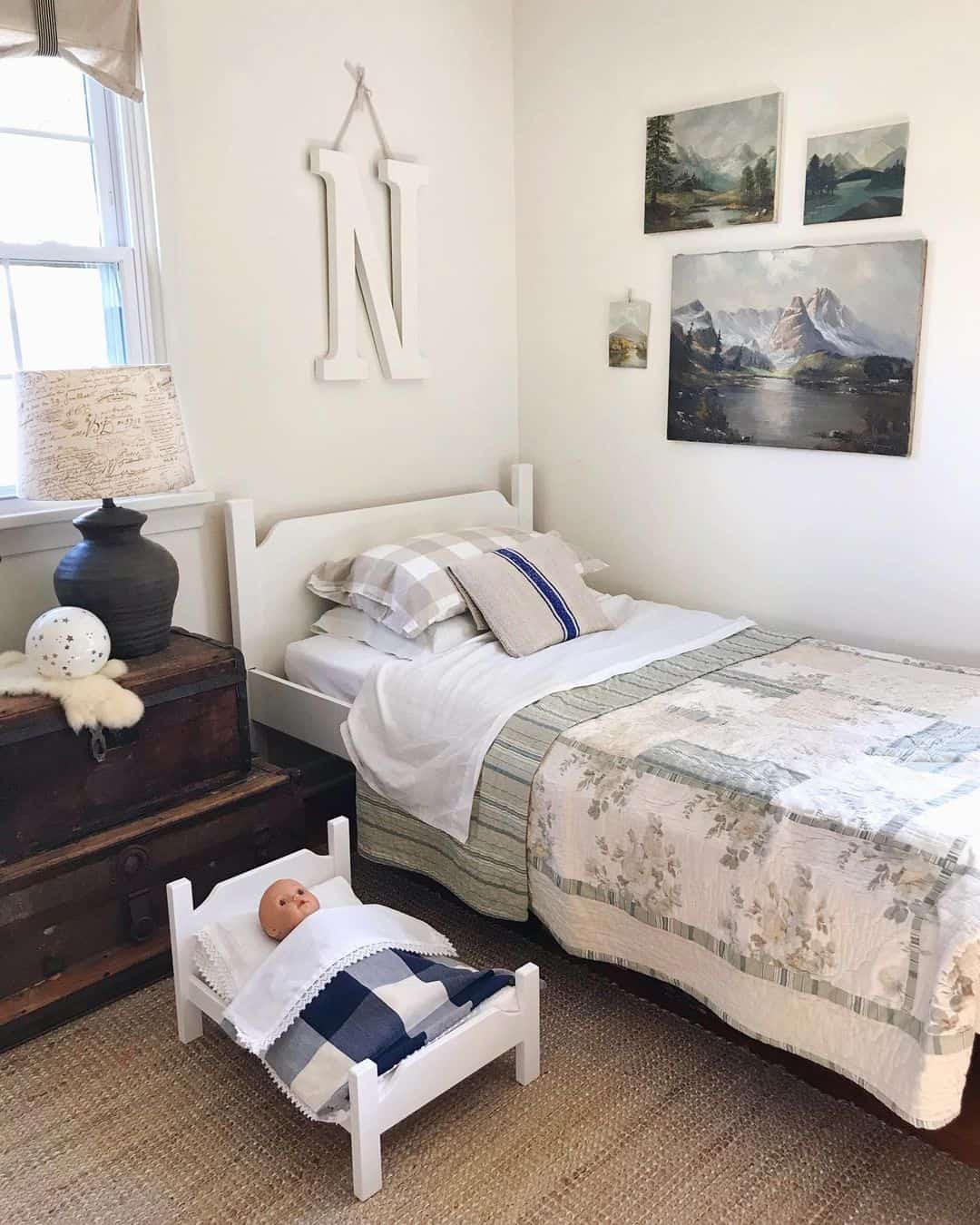 Vintage Landscape Paintings Add Artistic Charm Above a Bed