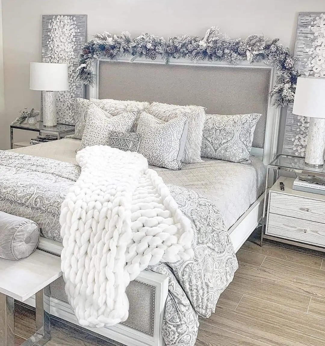 Frosted Garland Adds Winter Whimsy Above the Headboard