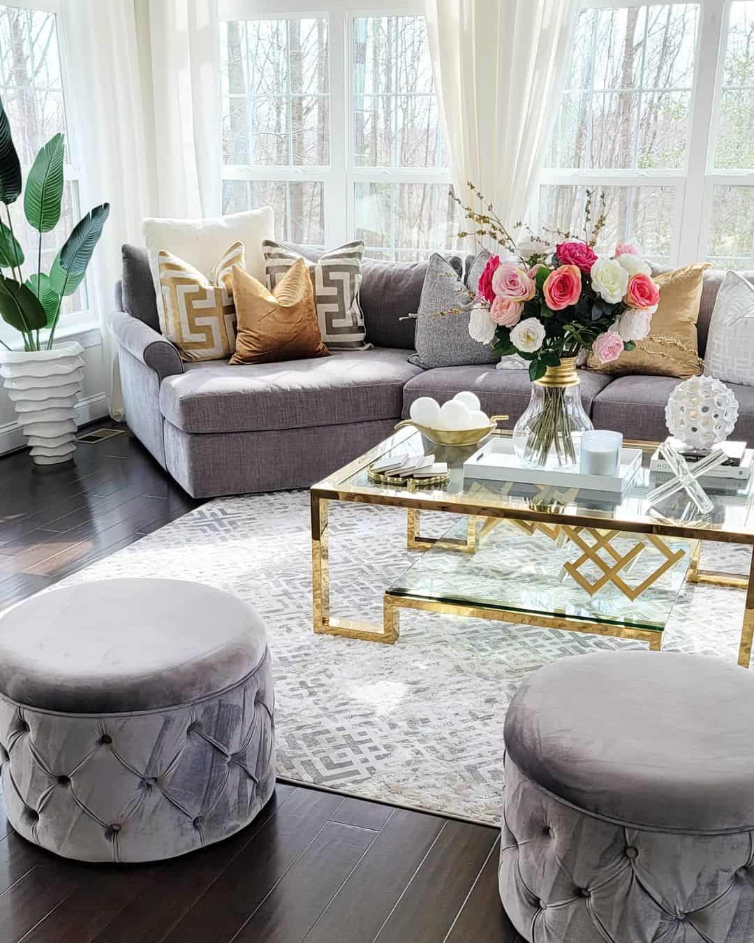 Glass and Gold Coffee Table With Geometric Accents