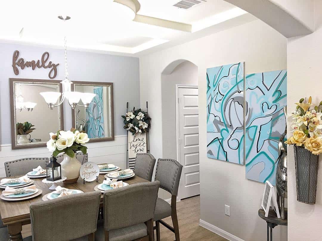 Diptych Artwork Adds a Bold Graphic Touch Above Paneled Walls