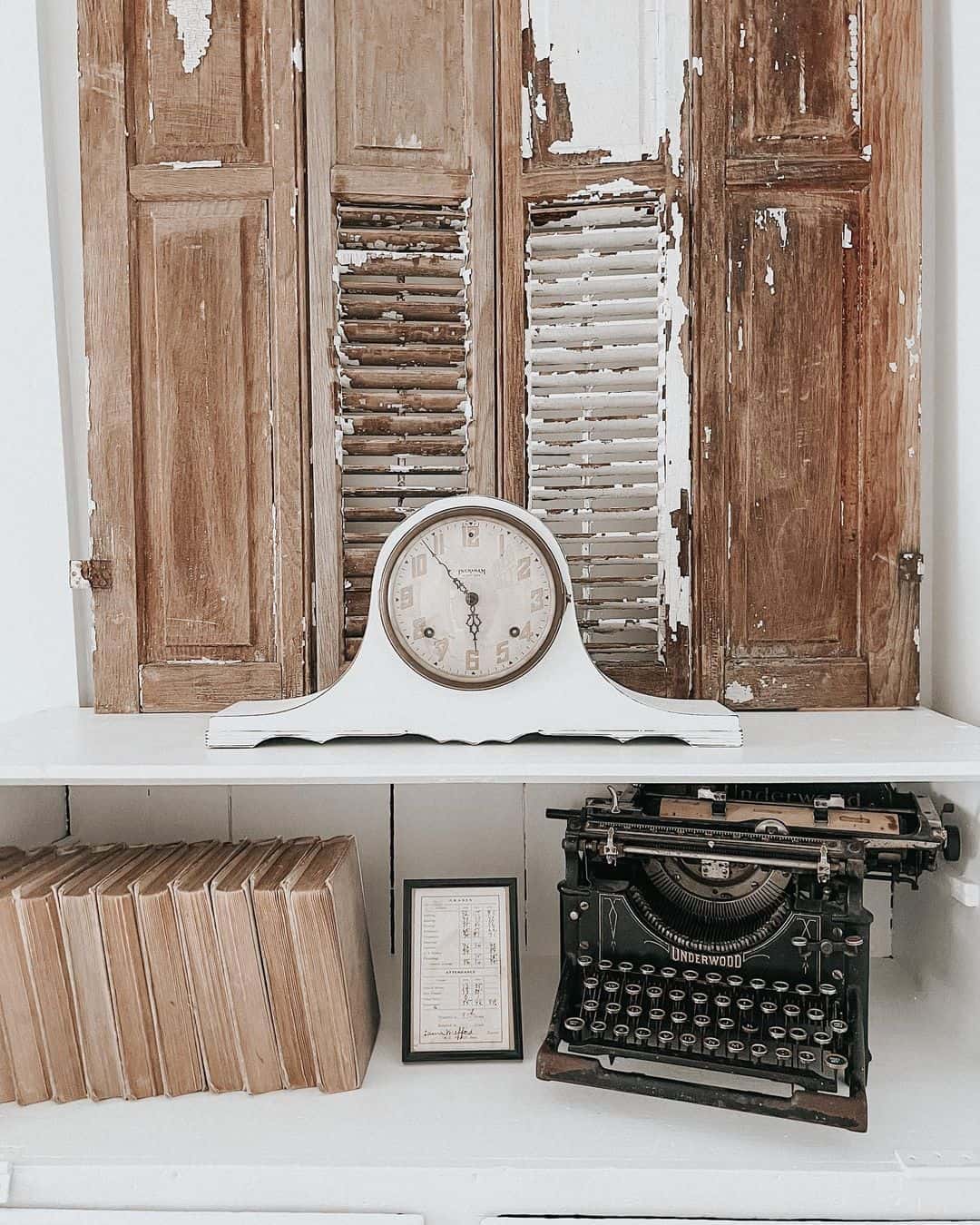 Weathered Shutters as a Textured Backdrop for Mantel Clocks