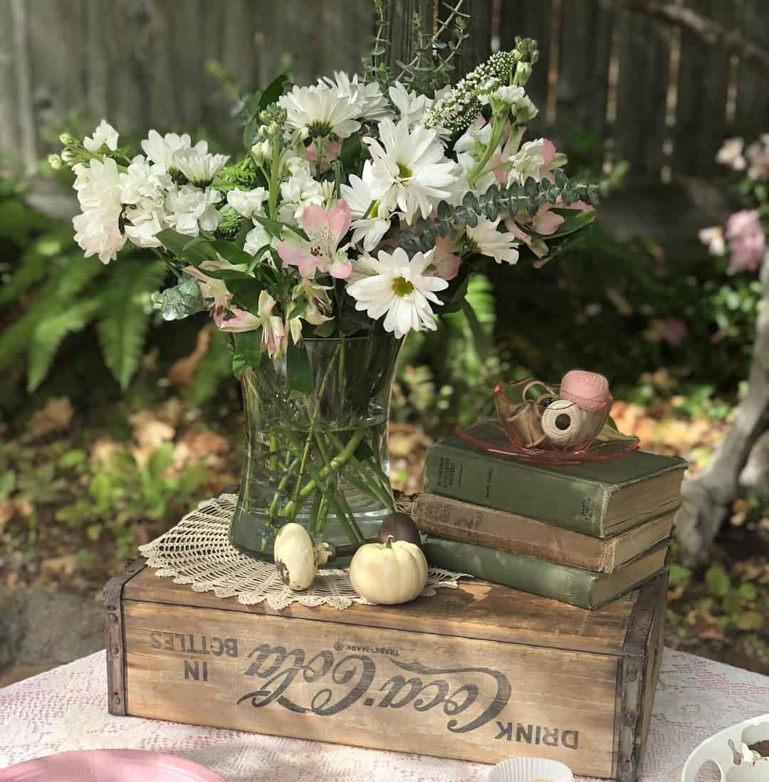 Stack Vintage Books as a Pedestal for Small Decor