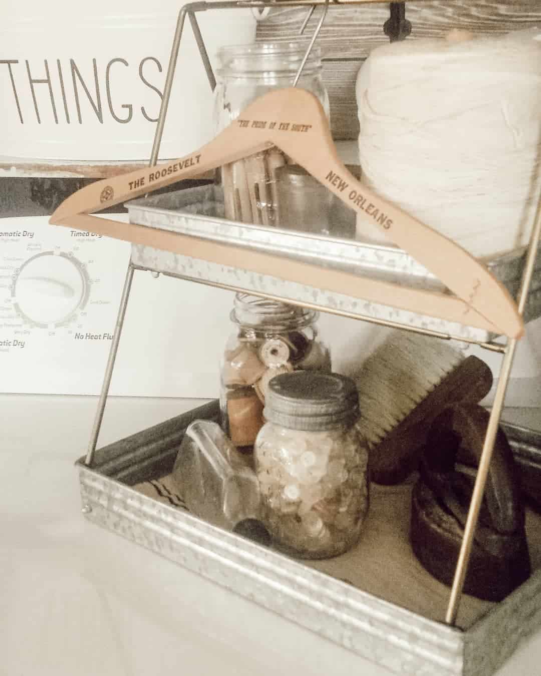 Vintage Hanger Displays Travel Souvenirs and Sewing Notions