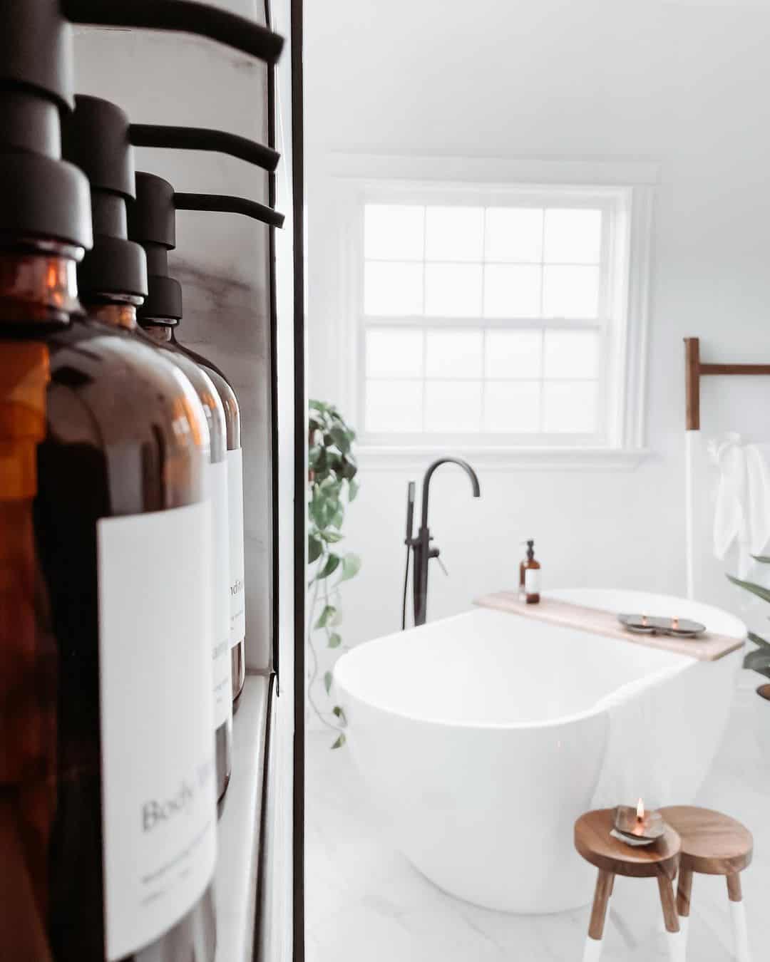 Amber Bottles on a Marble Shelf Organize Bath Essentials