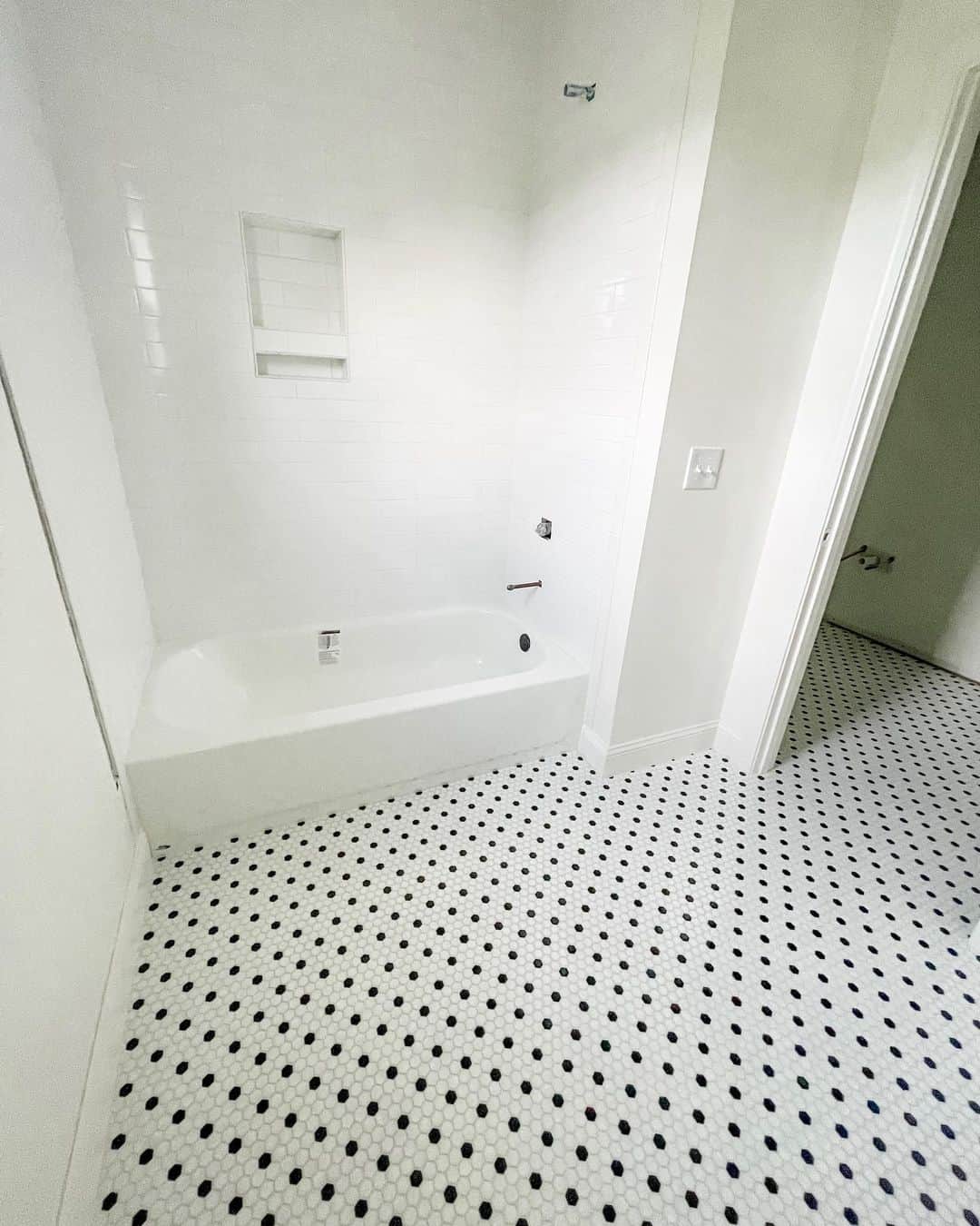 Classic Black and White Hex Tile Flooring for a Bold Foundation