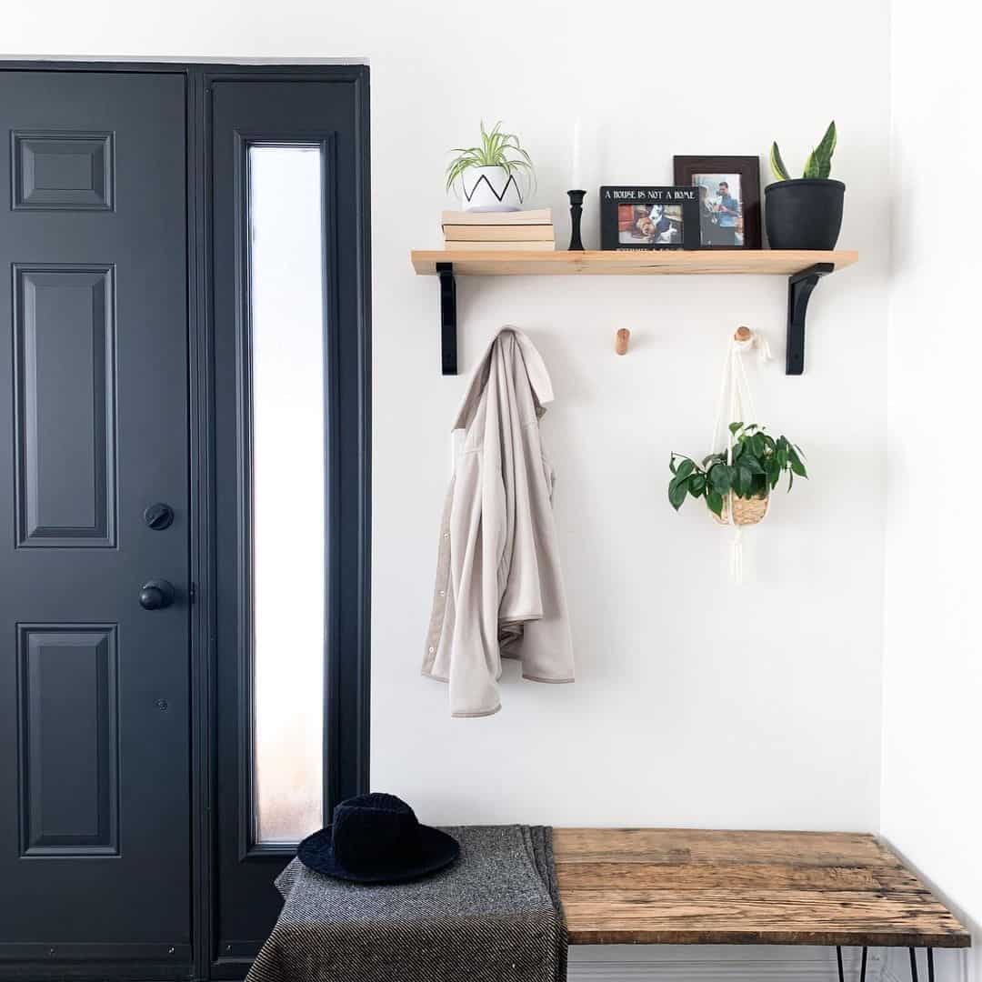 Floating Shelf Displays Personal Photos and Greenery