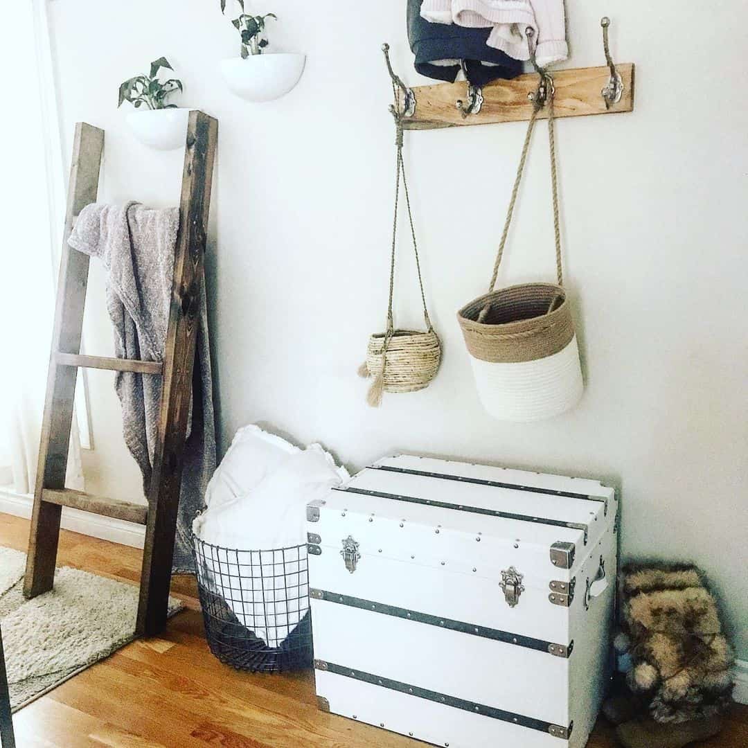 Drape Cozy Throws Over a Rustic Wooden Ladder