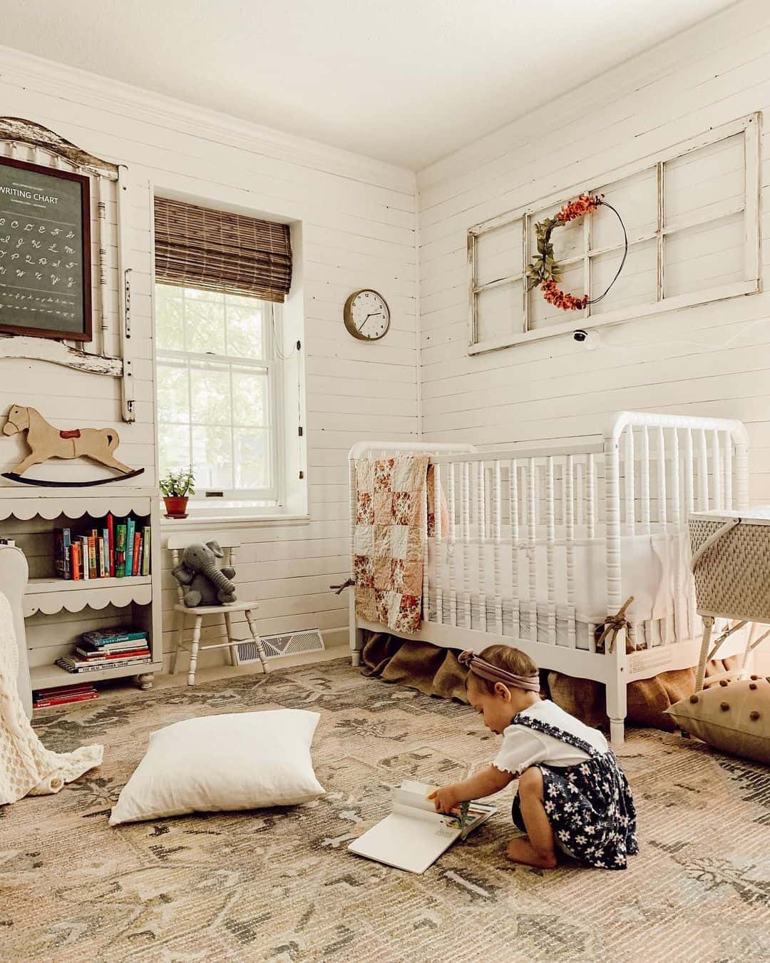 Vintage Window Frame Adds Rustic Charm Above the Crib